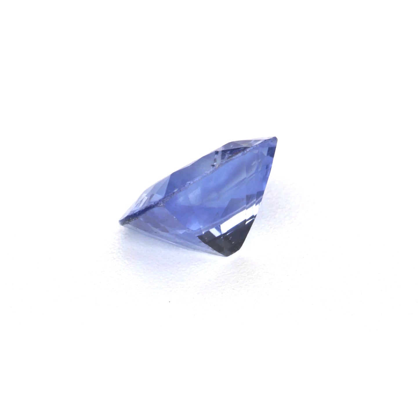0.54 Ct Tinted Blue Sapphire Rough Cut Ceylon
