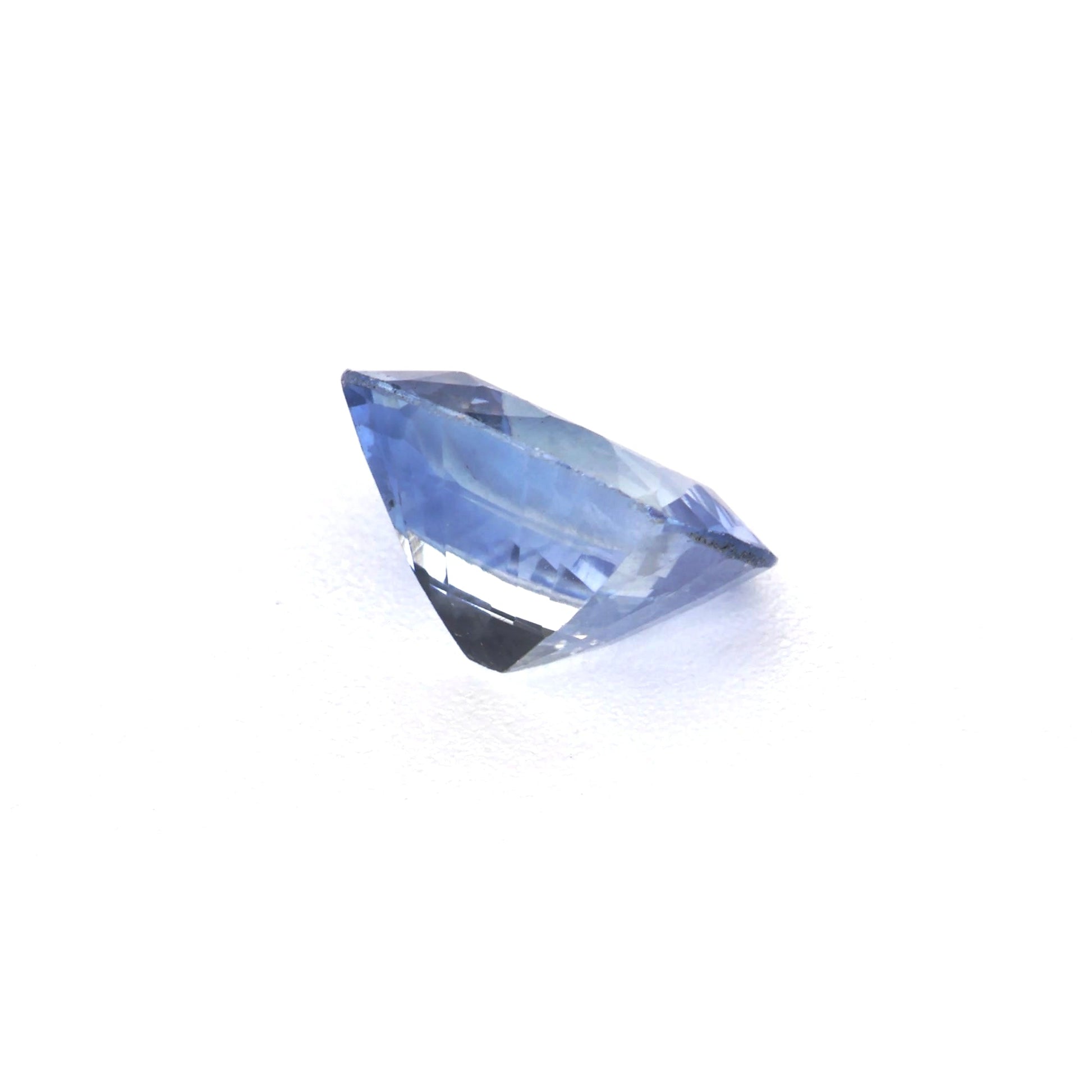 0.54 Ct Tinted Blue Sapphire Rough Cut Ceylon
