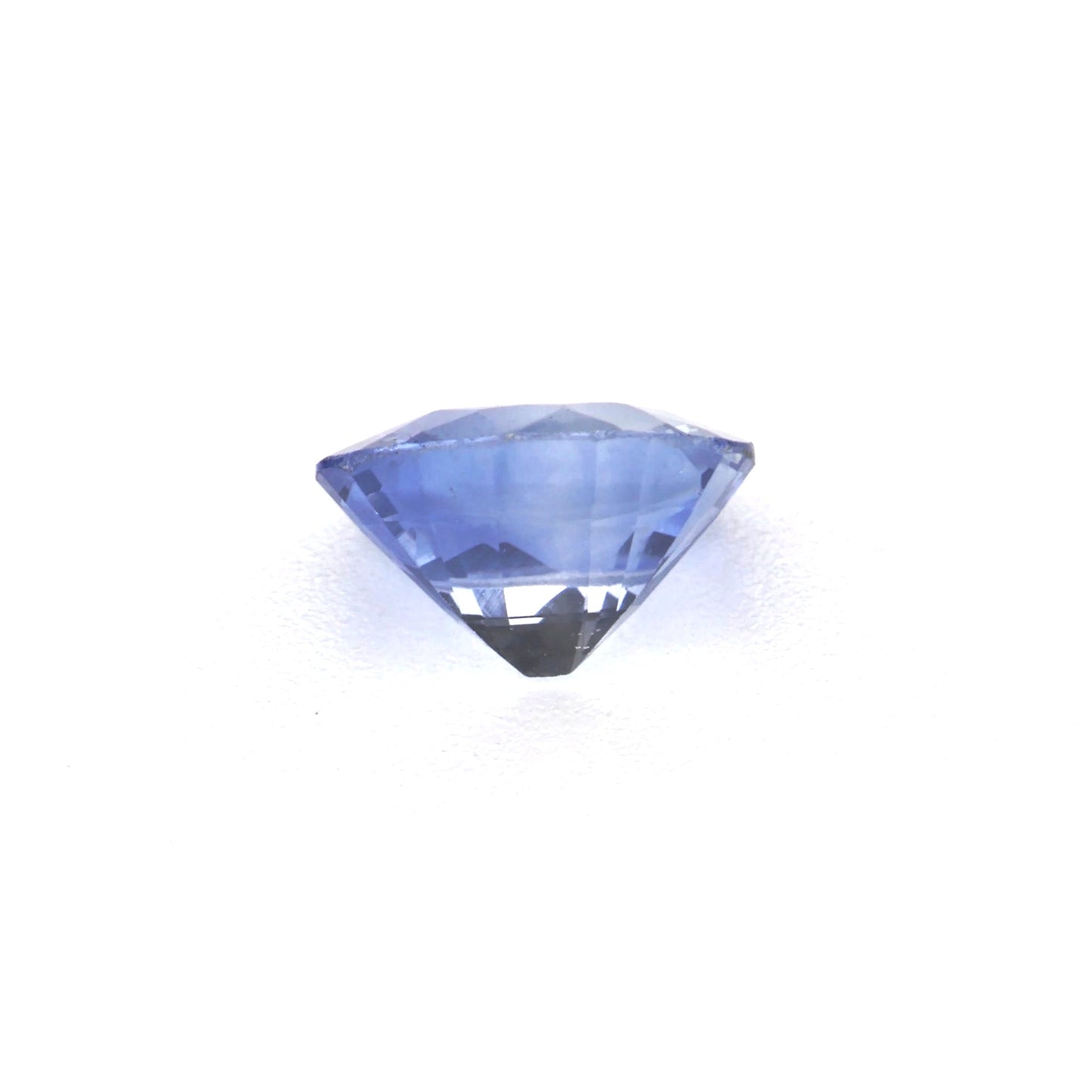 0.54 Ct Tinted Blue Sapphire Rough Cut Ceylon