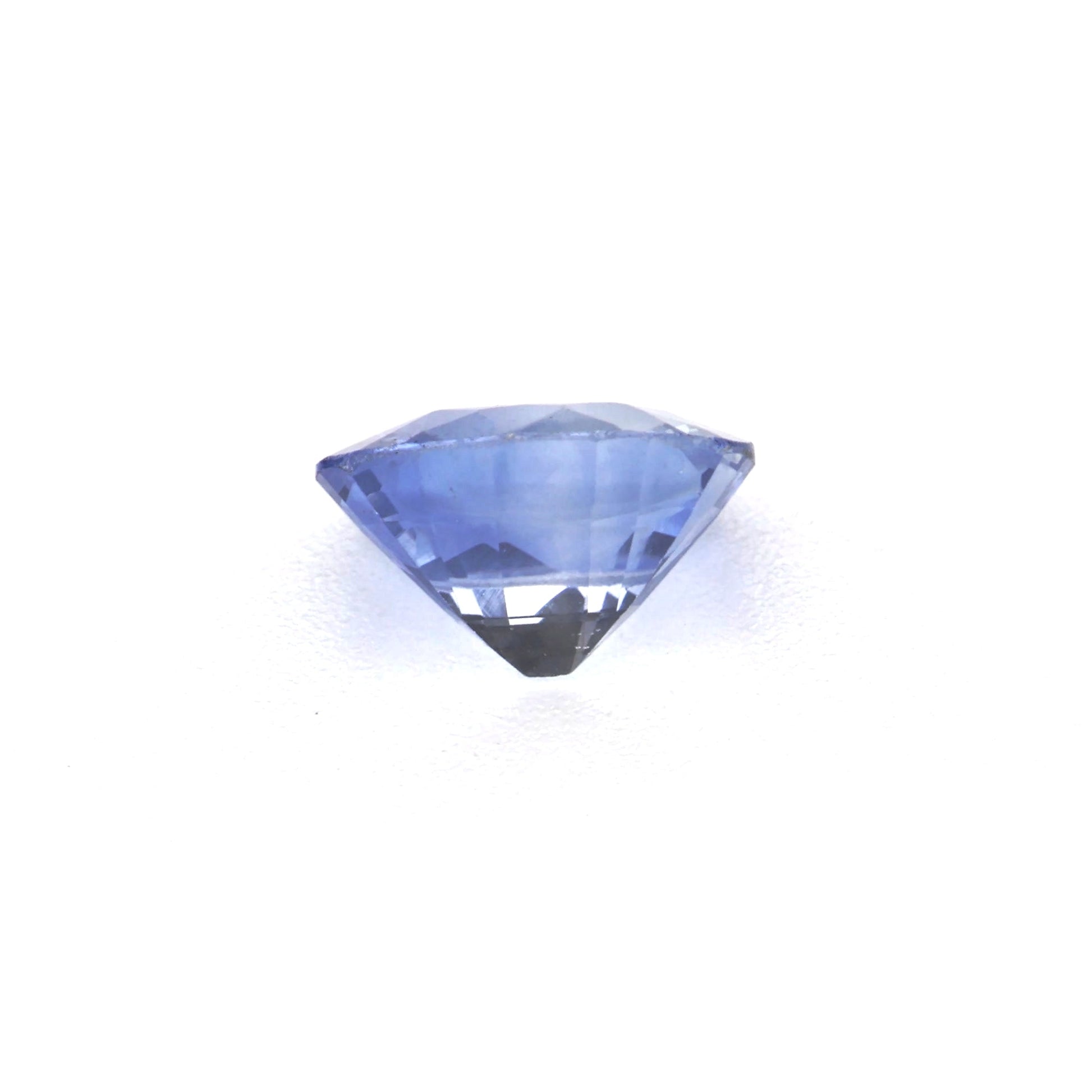 0.54 Ct Tinted Blue Sapphire Rough Cut Ceylon
