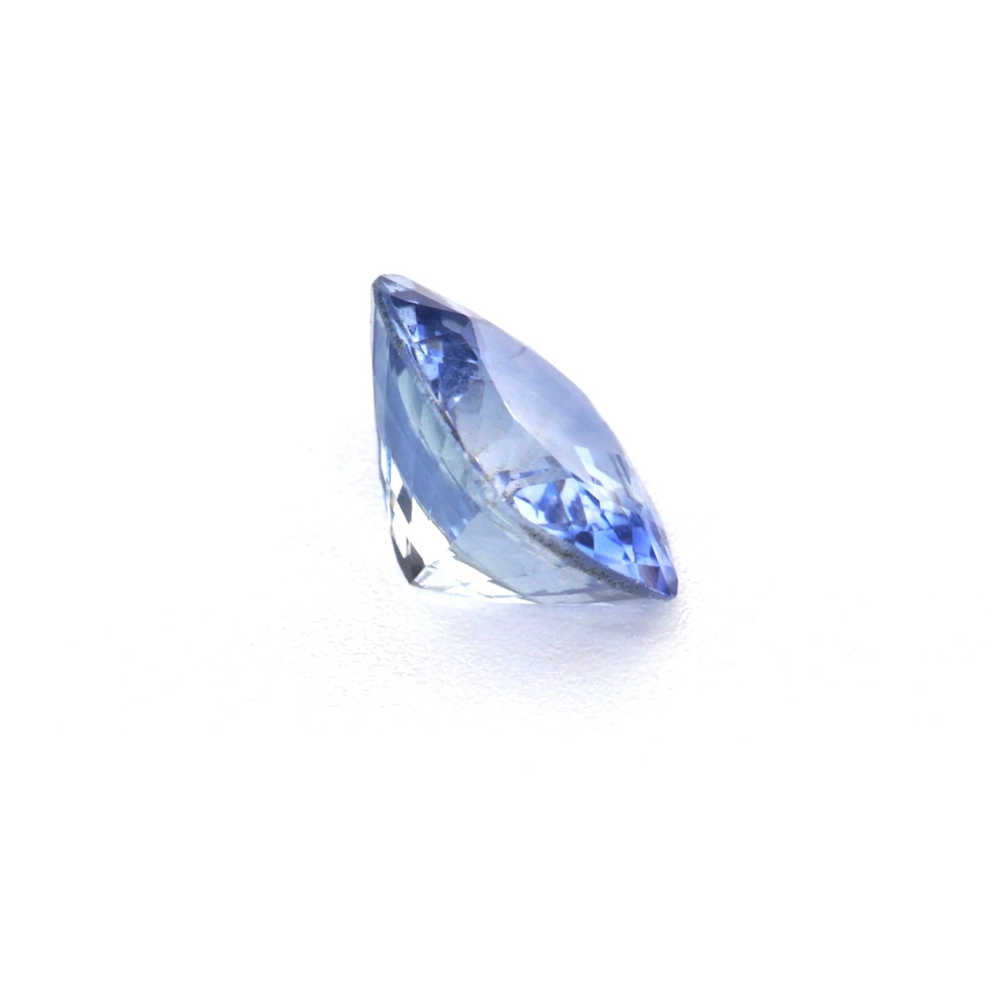 0.54 Ct Tinted Blue Sapphire Rough Cut Ceylon