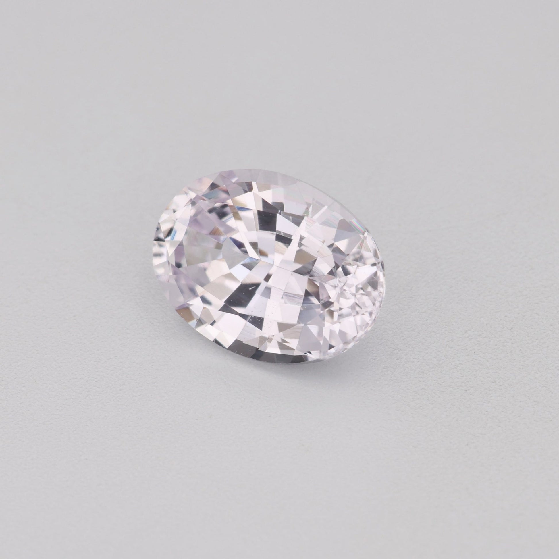 0.97 Ct Near Colourless (Pink Hue) Sapphire Rough Cut Ceylon