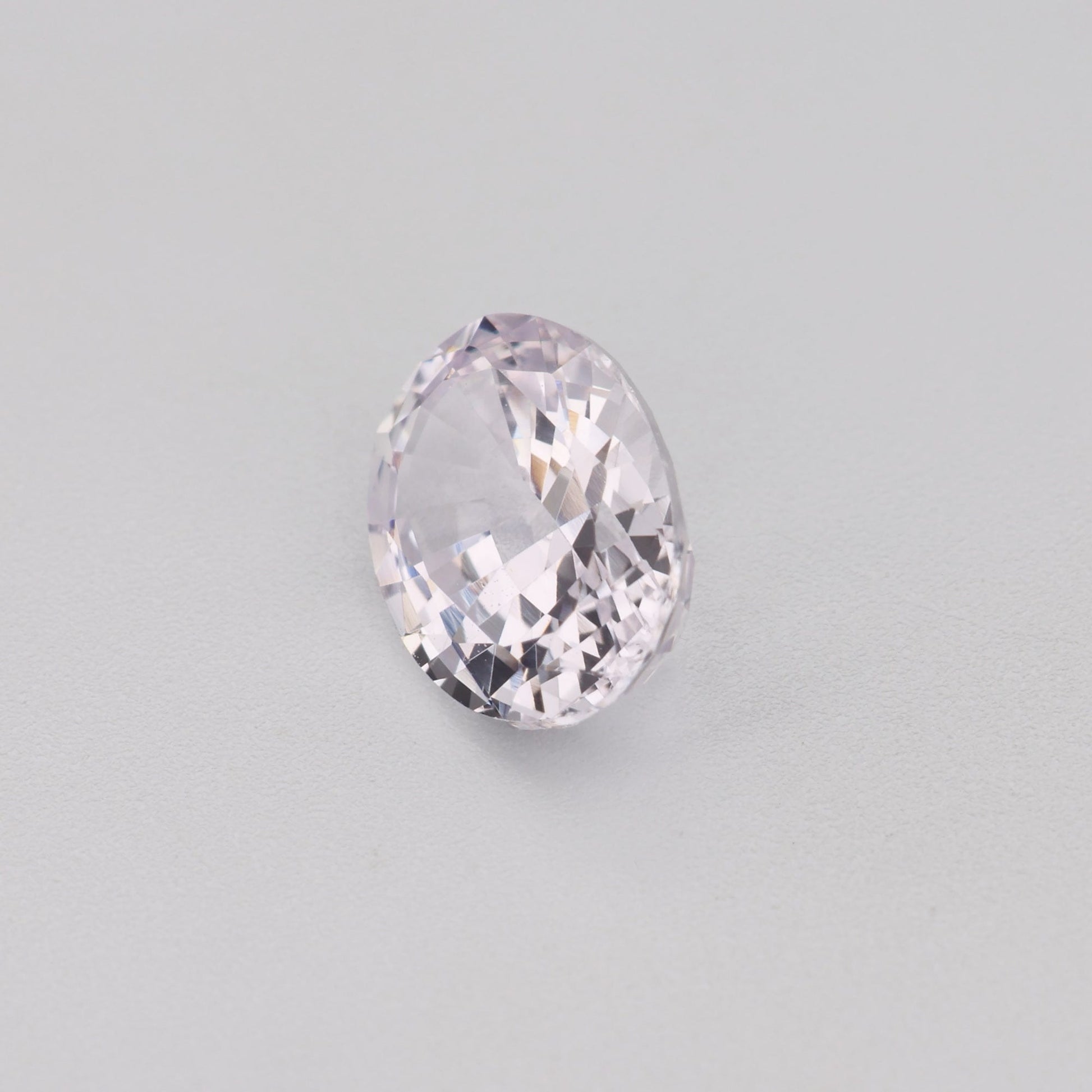 0.97 Ct Near Colourless (Pink Hue) Sapphire Rough Cut Ceylon