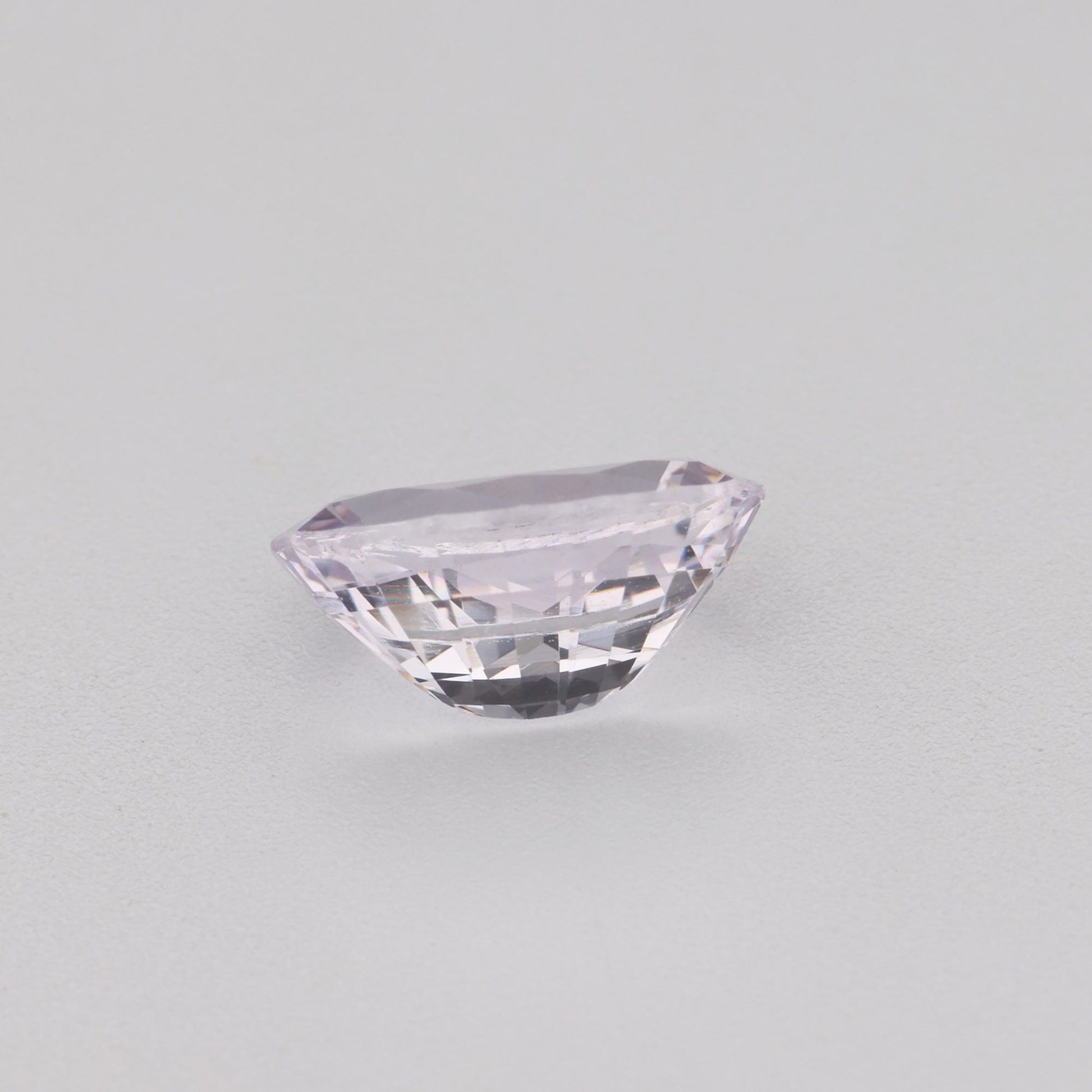 0.97 Ct Near Colourless (Pink Hue) Sapphire Rough Cut Ceylon