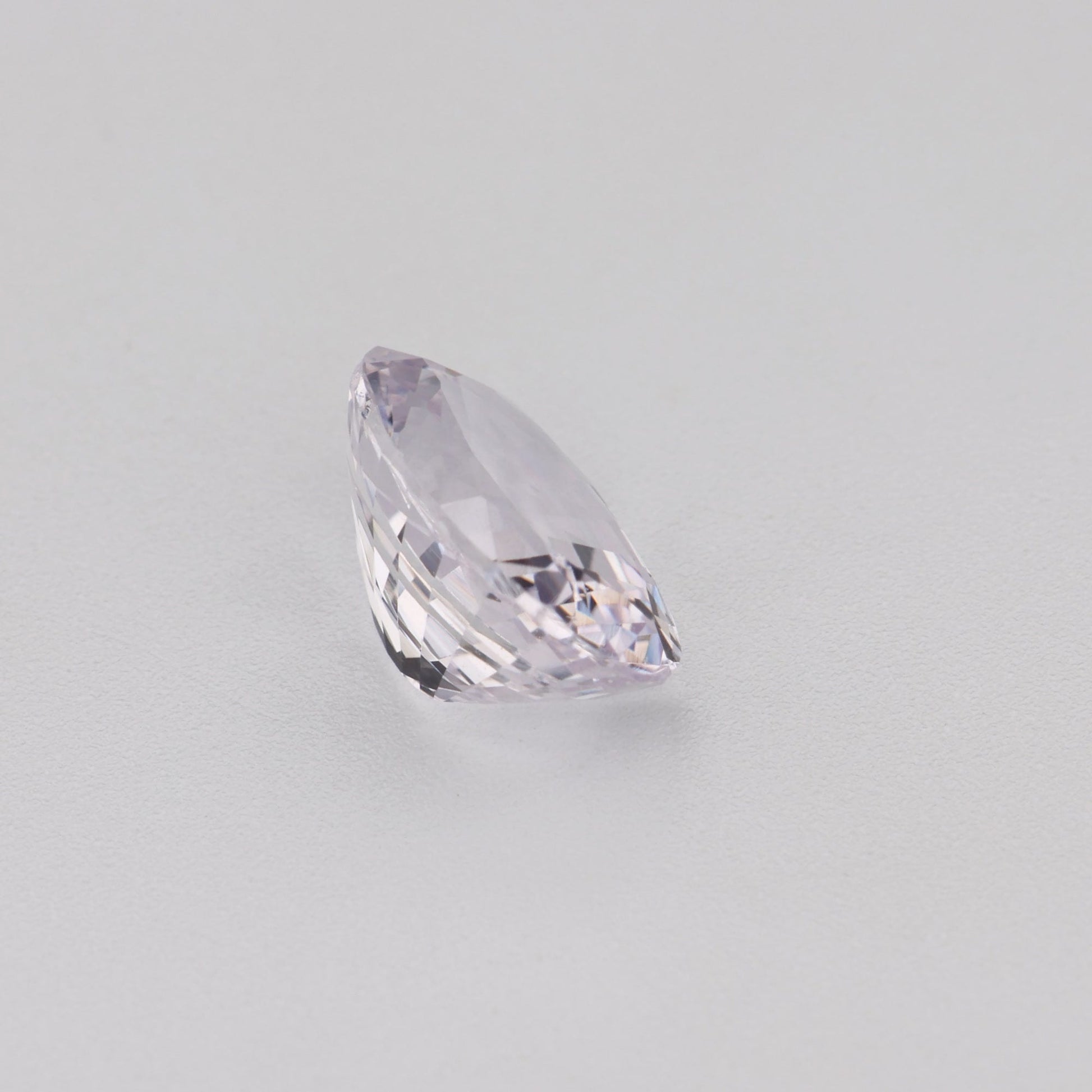 0.97 Ct Near Colourless (Pink Hue) Sapphire Rough Cut Ceylon
